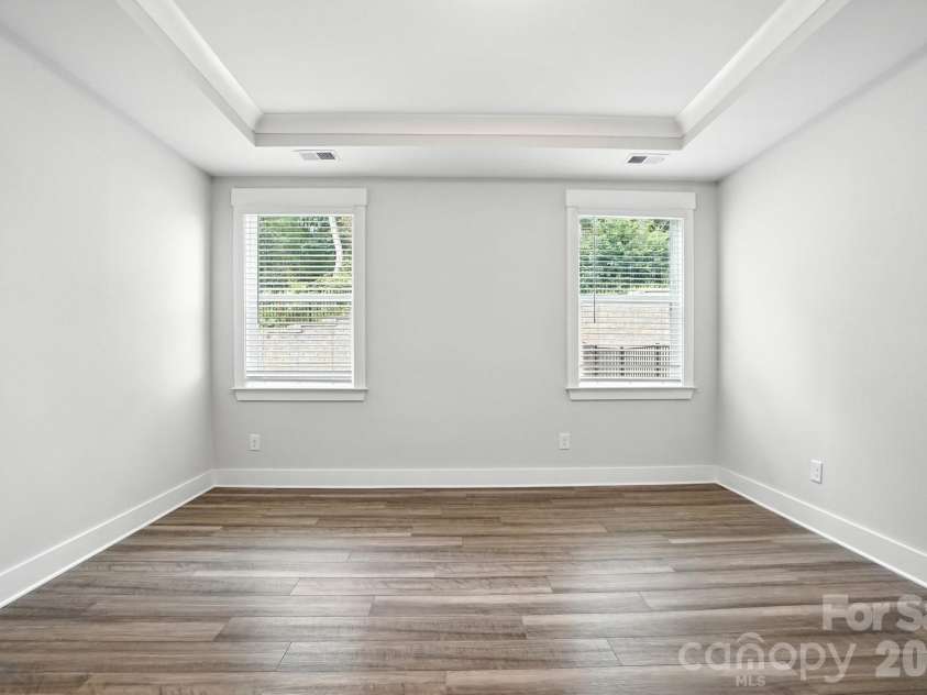 138 Prestwick Way, Mooresville, NC 28115.  MLS# CAR4285533, YatesRealty ID 13039. Primary bedroom