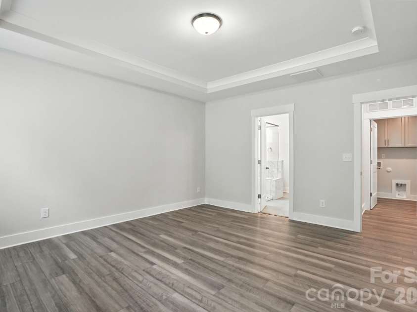138 Prestwick Way, Mooresville, NC 28115.  MLS# CAR4285533, YatesRealty ID 13039. Primary bedroom