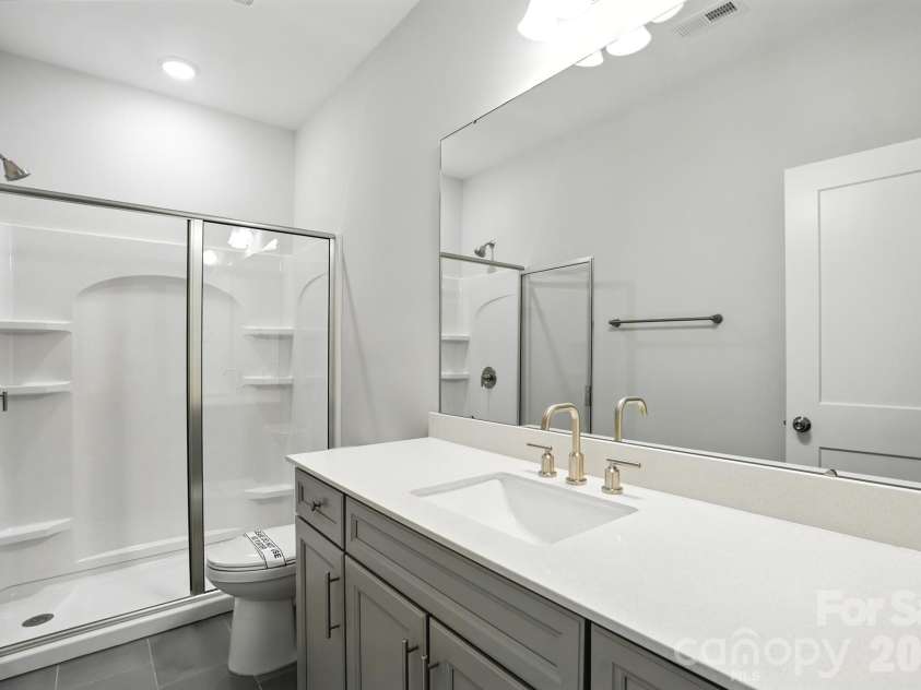 138 Prestwick Way, Mooresville, NC 28115.  MLS# CAR4285533, YatesRealty ID 13039. Secondary bathroom on the main