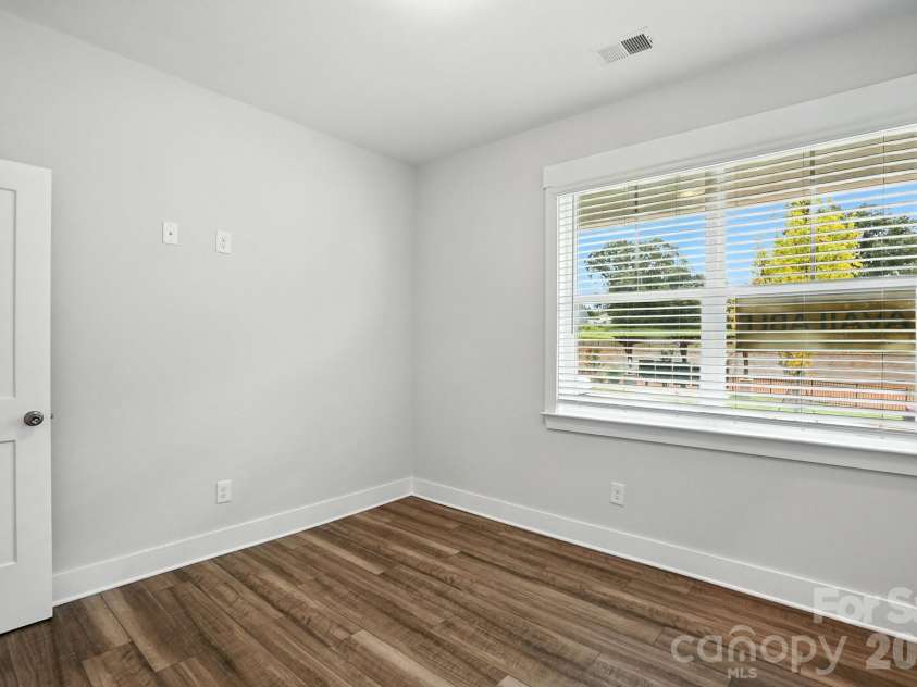138 Prestwick Way, Mooresville, NC 28115.  MLS# CAR4285533, YatesRealty ID 13039. Secondary bedroom on the main