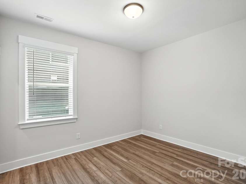 138 Prestwick Way, Mooresville, NC 28115.  MLS# CAR4285533, YatesRealty ID 13039. Secondary bedroom on the main