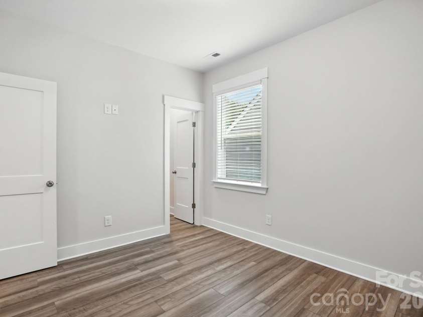 138 Prestwick Way, Mooresville, NC 28115.  MLS# CAR4285533, YatesRealty ID 13039. Secondary bedroom on the main