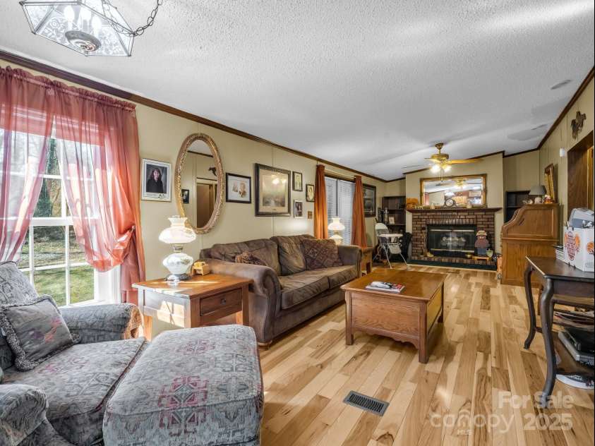 718 Winn Road, Mooresboro, NC 28114.  MLS# CAR4223091, YatesRealty ID 1304. Living Room
