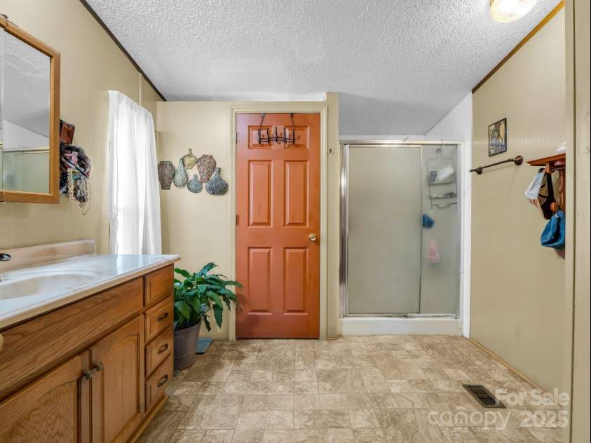 718 Winn Road, Mooresboro, NC 28114.  MLS# CAR4223091, YatesRealty ID 1304. Primary Bath