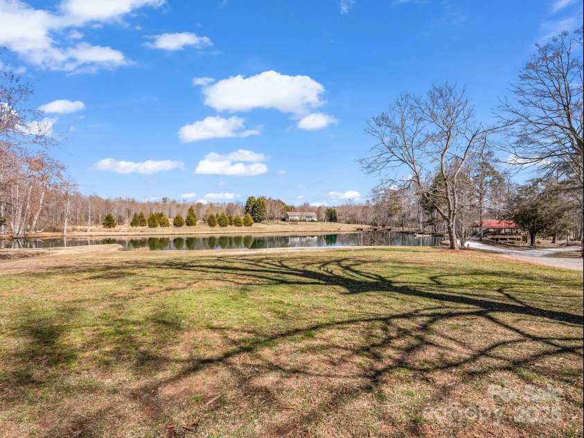 718 Winn Road, Mooresboro, NC 28114.  MLS# CAR4223091, YatesRealty ID 1304. View of pond from house