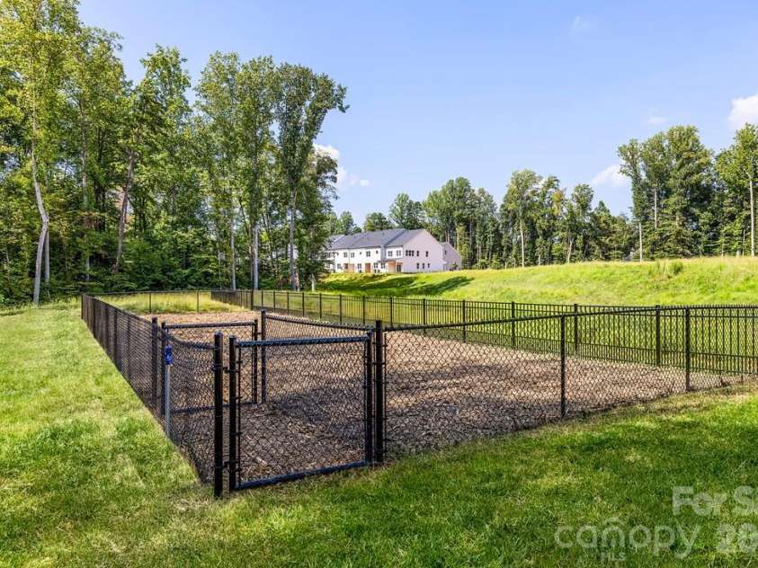 3062 Finchborough Court, Charlotte, NC 28269.  MLS# CAR4291915, YatesRealty ID 13040. A fenced-in dog park—perfect for play, exercise, and making furry friends!