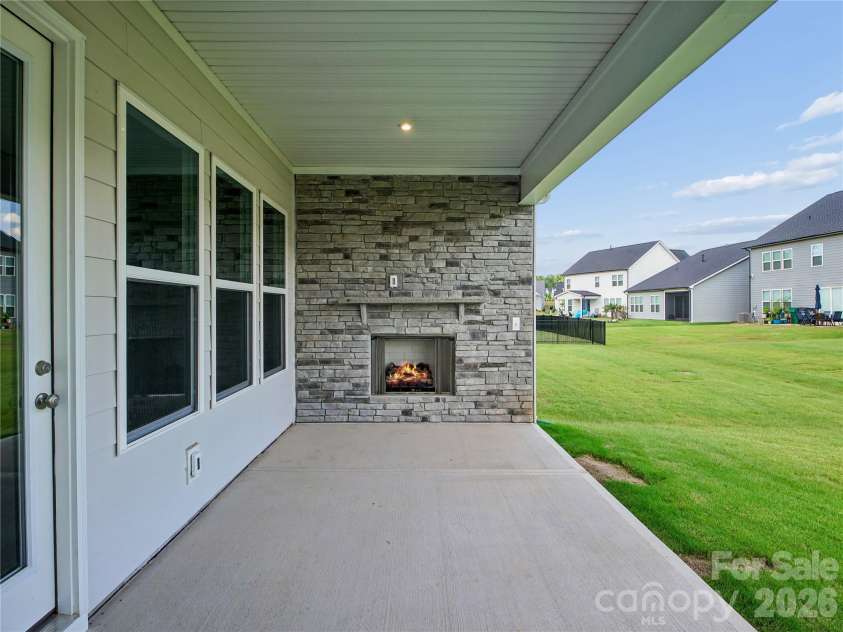 5321 Mint Harbor Way, Charlotte, NC 28269.  MLS# CAR4304757, YatesRealty ID 13042. Covered Rear Patio