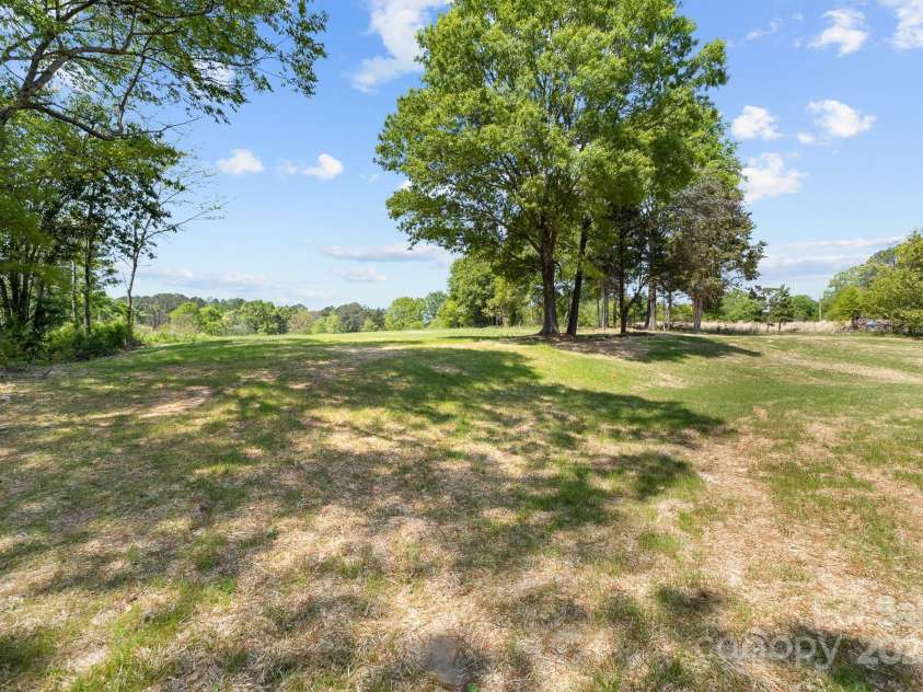 1037 Dameron Road, Bessemer City, NC 28016.  MLS# CAR4226755, YatesRealty ID 13043. Rear Elevation Showing the Expansive Back Yard!