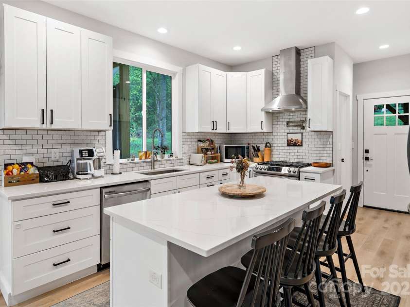 39 Holly Ridge Drive, Old Fort, NC 28762.  MLS# CAR4248406, YatesRealty ID 13049. Kitchen w/ large island