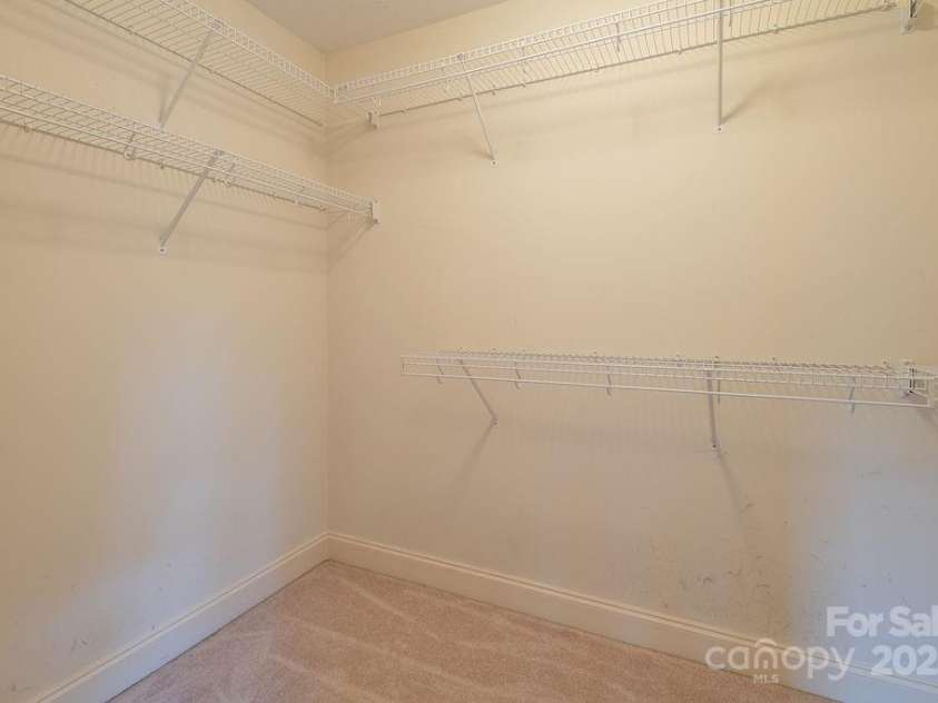 104 Double Brook Drive, Weaverville, NC 28787.  MLS# CAR4245056, YatesRealty ID 13057. Large primary bedroom closet