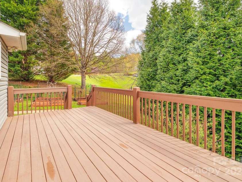 104 Double Brook Drive, Weaverville, NC 28787.  MLS# CAR4245056, YatesRealty ID 13057. Spacious deck