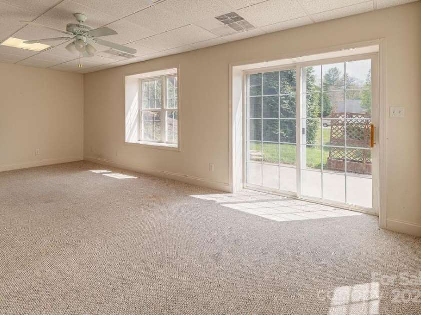 104 Double Brook Drive, Weaverville, NC 28787.  MLS# CAR4245056, YatesRealty ID 13057. Walk out basement