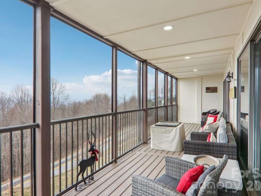 1601 Fleetwood Plaza, Hendersonville, NC 28739.  MLS# CAR4352883, YatesRealty ID 13058. Long range views from screened in porch