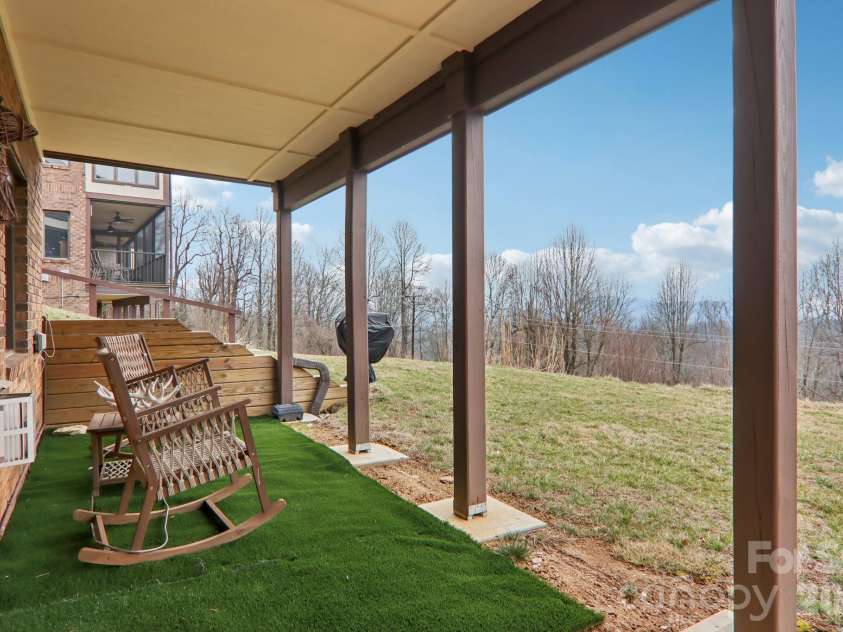 1601 Fleetwood Plaza, Hendersonville, NC 28739.  MLS# CAR4352883, YatesRealty ID 13058. Outside seating from basement
