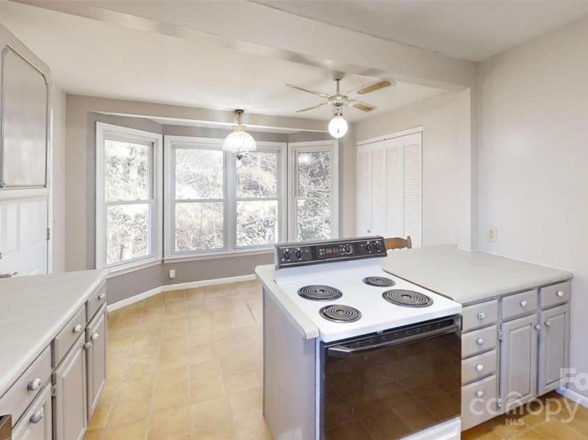 59 Upper Saw Branch Road, Candler, NC 28715.  MLS# CAR4226917, YatesRealty ID 13059. 
