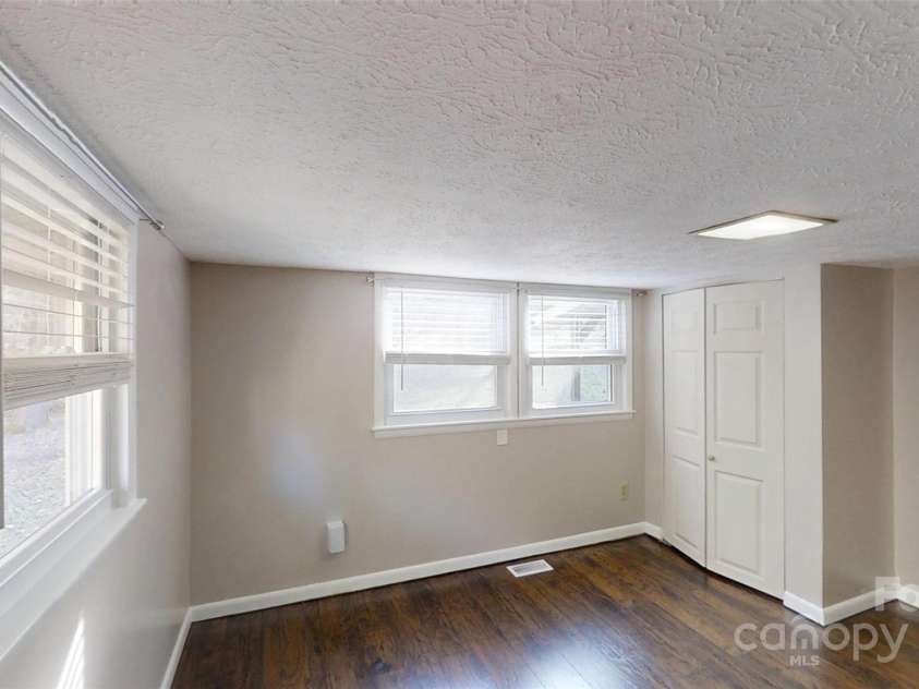 59 Upper Saw Branch Road, Candler, NC 28715.  MLS# CAR4226917, YatesRealty ID 13059. 