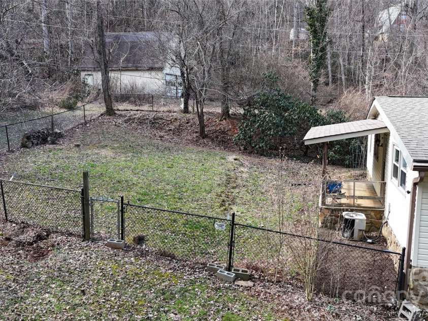 59 Upper Saw Branch Road, Candler, NC 28715.  MLS# CAR4226917, YatesRealty ID 13059. Fenced in back yard