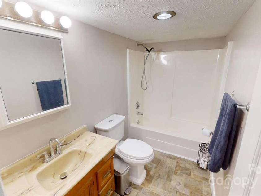 59 Upper Saw Branch Road, Candler, NC 28715.  MLS# CAR4226917, YatesRealty ID 13059. Full bathroom two view