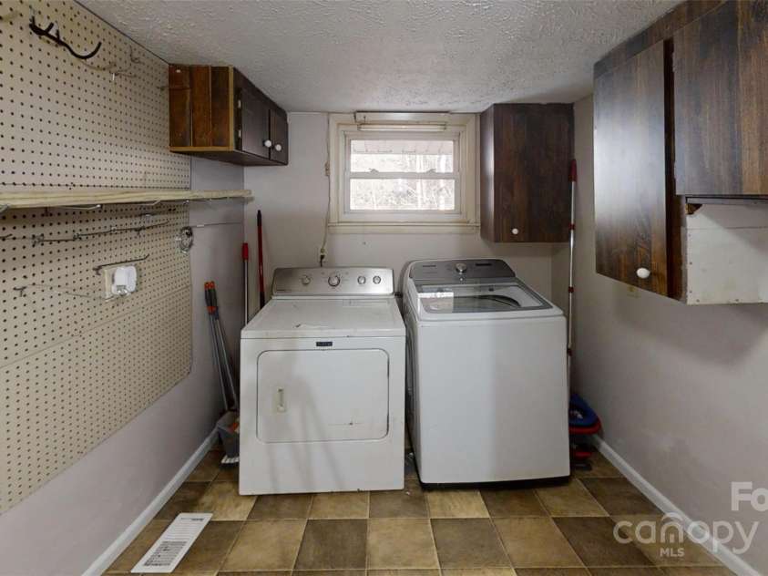 59 Upper Saw Branch Road, Candler, NC 28715.  MLS# CAR4226917, YatesRealty ID 13059. Laundry room