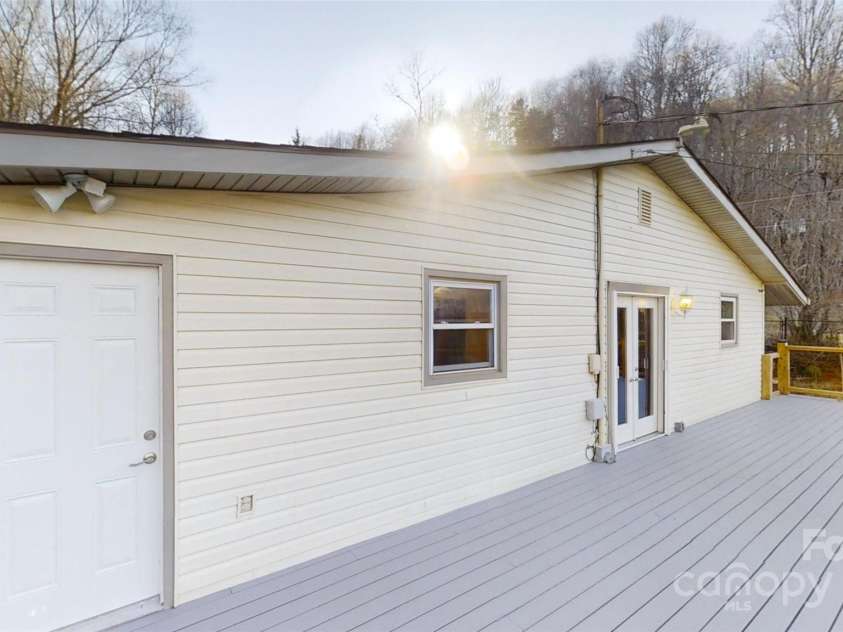 59 Upper Saw Branch Road, Candler, NC 28715.  MLS# CAR4226917, YatesRealty ID 13059. New deck