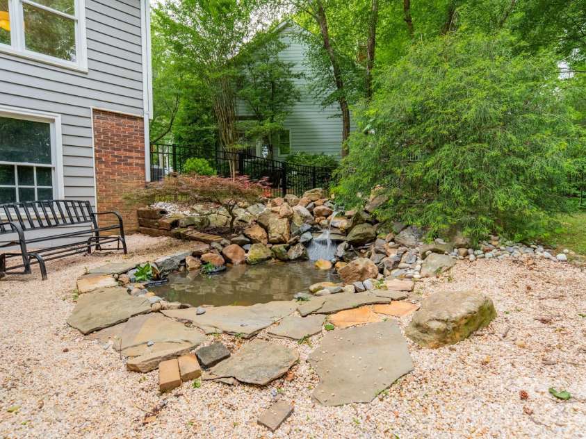 2907 Notchview Court, Charlotte, NC 28210.  MLS# CAR4257464, YatesRealty ID 13068. Backyard Pond