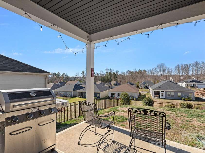 3941 Isenhour Road, Kannapolis, NC 28081.  MLS# CAR4356574, YatesRealty ID 13078. Covered back area