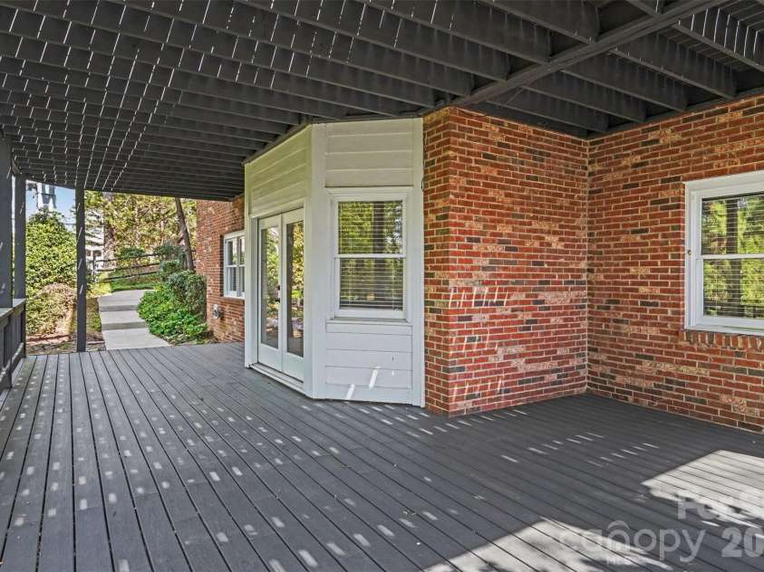 1941 Kilmonack Lane, Charlotte, NC 28270.  MLS# CAR4363894, YatesRealty ID 13079. Lower level covered balcony