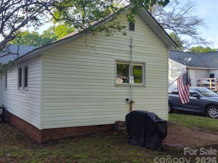 608 Poplar Avenue, Kannapolis, NC 28081.  MLS# CAR4367579, YatesRealty ID 13083. Back patio.