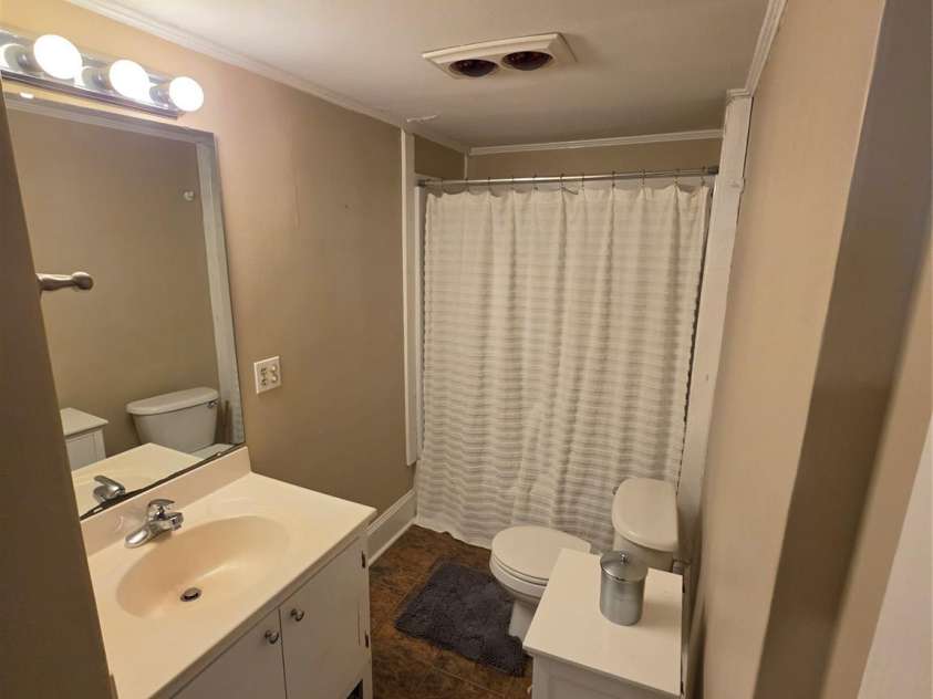 608 Poplar Avenue, Kannapolis, NC 28081.  MLS# CAR4367579, YatesRealty ID 13083. Bathroom with linen closet.