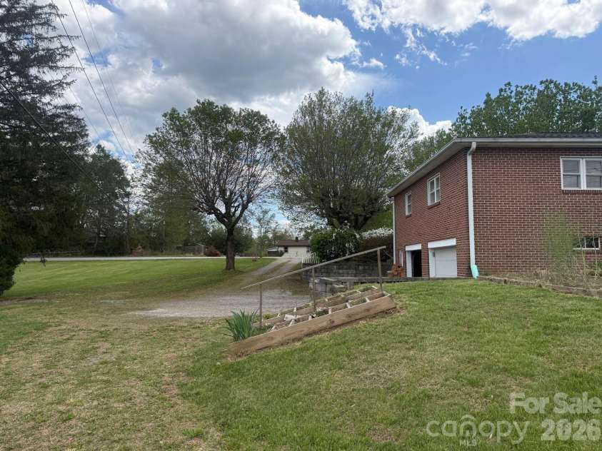 343 Brickyard Road, Etowah, NC 28729.  MLS# CAR4369195, YatesRealty ID 13084. 