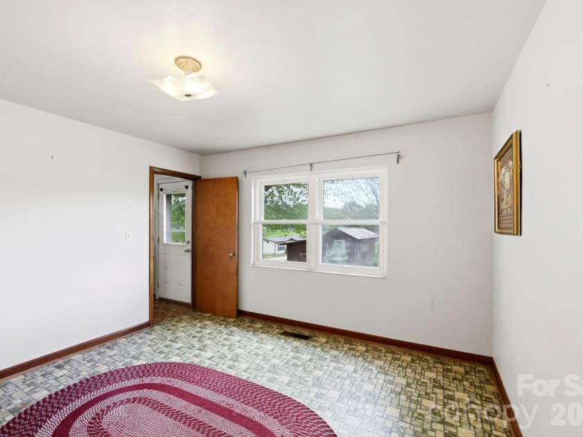 343 Brickyard Road, Etowah, NC 28729.  MLS# CAR4369195, YatesRealty ID 13084. Dining Room area off kitchen 