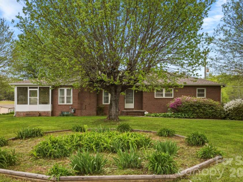 343 Brickyard Road, Etowah, NC 28729.  MLS# CAR4369195, YatesRealty ID 13084. Front view of the home 