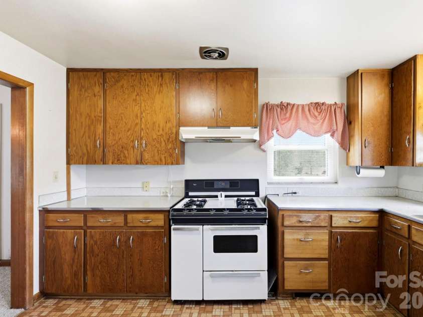 343 Brickyard Road, Etowah, NC 28729.  MLS# CAR4369195, YatesRealty ID 13084. Open kitchen 
