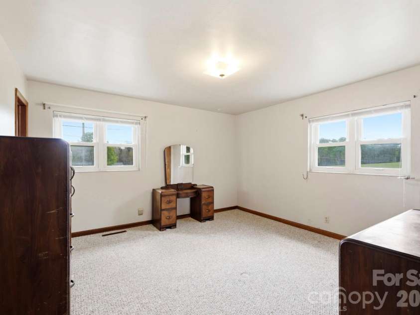 343 Brickyard Road, Etowah, NC 28729.  MLS# CAR4369195, YatesRealty ID 13084. Primary bedroom 