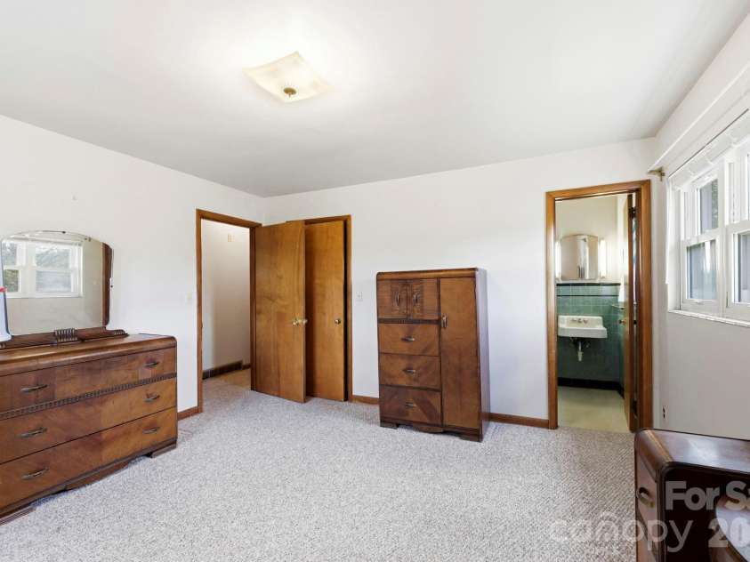 343 Brickyard Road, Etowah, NC 28729.  MLS# CAR4369195, YatesRealty ID 13084. Primary bedroom 