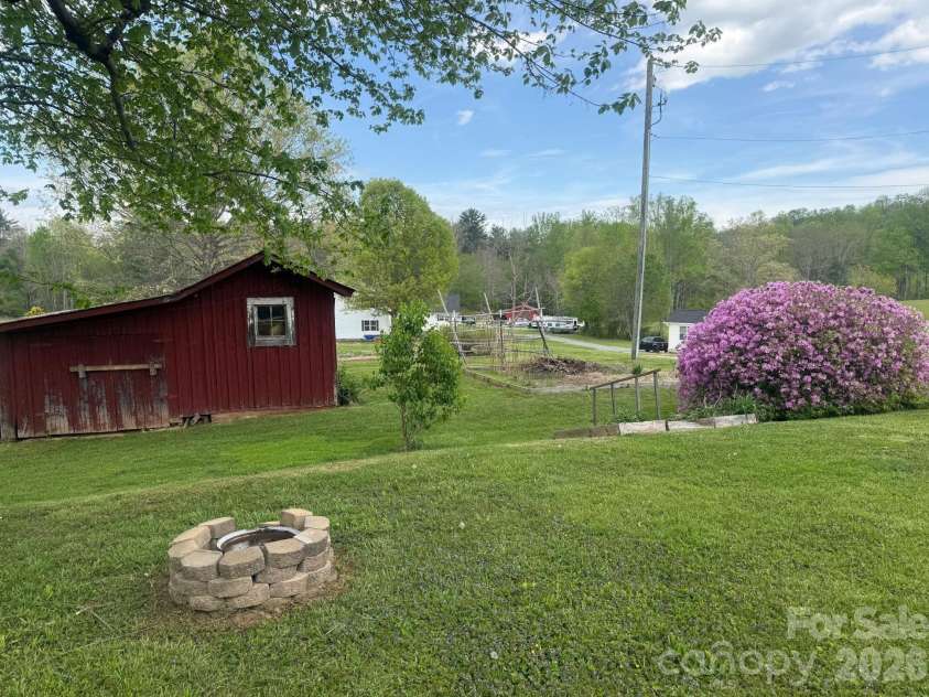 343 Brickyard Road, Etowah, NC 28729.  MLS# CAR4369195, YatesRealty ID 13084. Shed for your household items or tools 