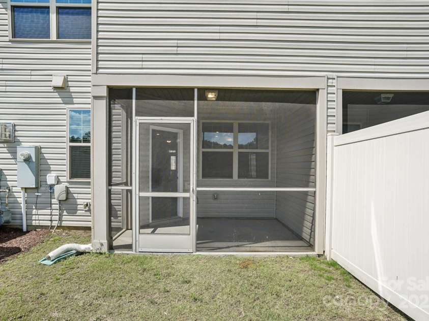 5254 Spanish Ivy Lane, Indian Land, SC 29707.  MLS# CAR4258702, YatesRealty ID 13086. Upgraded screened in rear patio