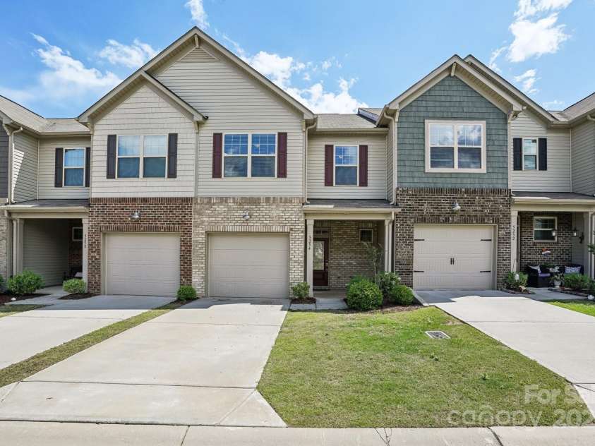 5254 Spanish Ivy Lane, Indian Land, SC 29707.  MLS# CAR4258702, YatesRealty ID 13086. Welcome Home! Notice the partial brick and the additional parking for your guests!