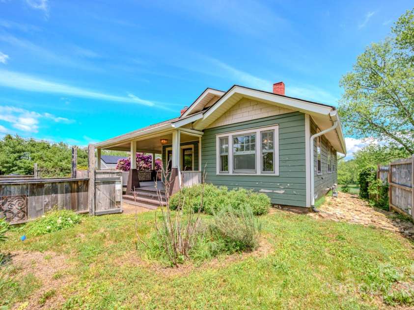 51 Old Nc 20 Highway, Asheville, NC 28806.  MLS# CAR4259014, YatesRealty ID 13089. Side view of the home