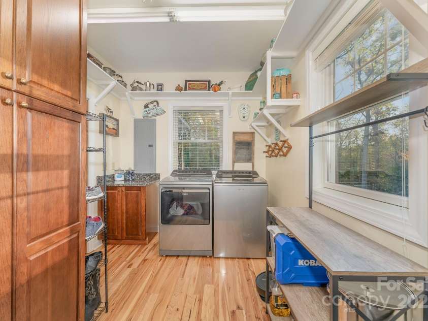 1133 Junior Dairy Road, Ennice, NC 28623.  MLS# CAR4189212, YatesRealty ID 1309. 1st floor laundry room