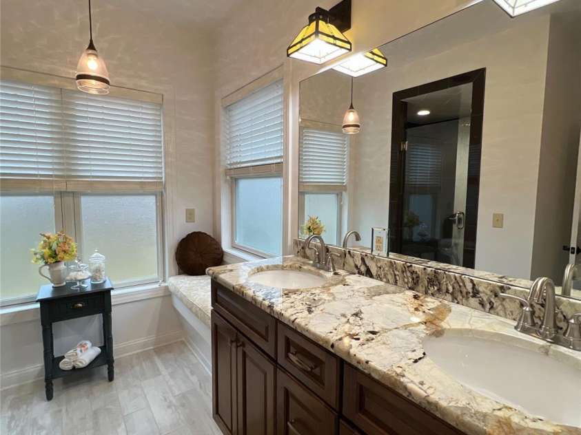 1133 Junior Dairy Road, Ennice, NC 28623.  MLS# CAR4189212, YatesRealty ID 1309. Primary bathroom has been updated a neutral color.