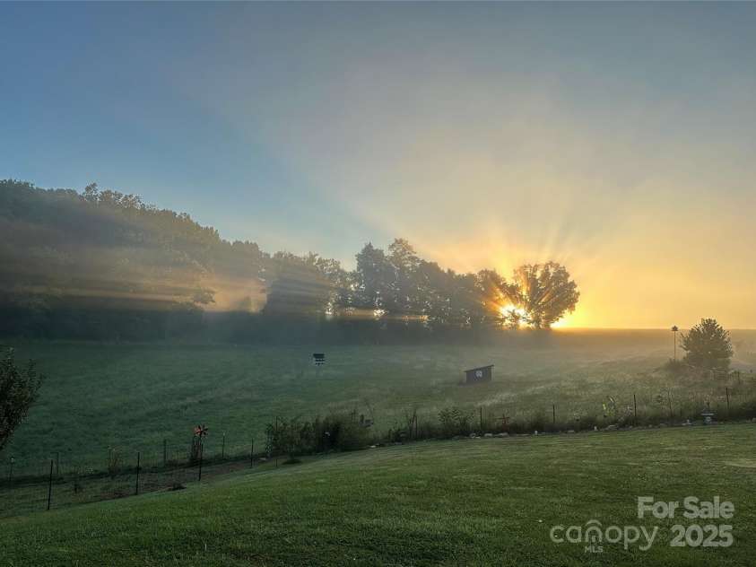 1133 Junior Dairy Road, Ennice, NC 28623.  MLS# CAR4189212, YatesRealty ID 1309. Sunrise