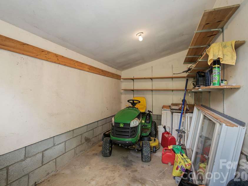 385 Chunns Cove Road, Asheville, NC 28805.  MLS# CAR4397492, YatesRealty ID 1309. Attached Shed