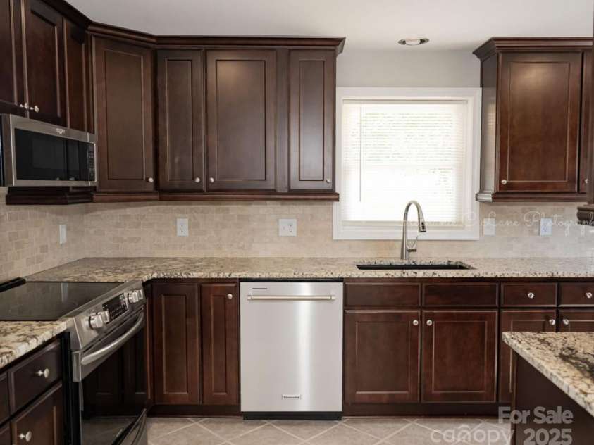 728 Morningside Drive, Mount Holly, NC 28120.  MLS# CAR4259449, YatesRealty ID 13090. 