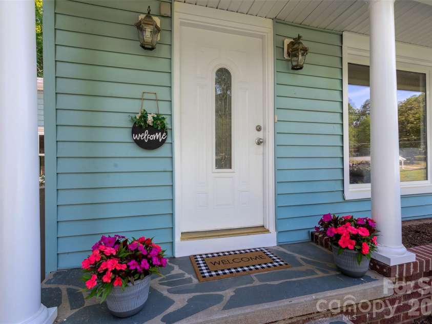 782 Ideal Drive, Concord, NC 28025.  MLS# CAR4370544, YatesRealty ID 13093. Welcoming covered front porch.