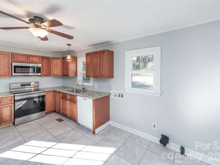 2271 Knowles Street, Kannapolis, NC 28083.  MLS# CAR4339778, YatesRealty ID 13094. Kitchen with laundry hook ups