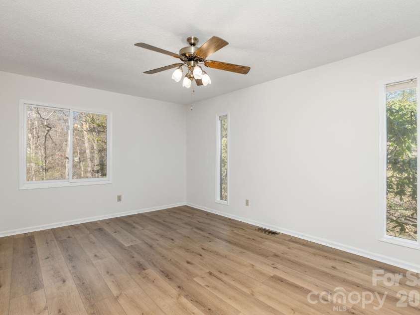3113 Primrose Drive, Hendersonville, NC 28792.  MLS# CAR4359967, YatesRealty ID 13099. Primary bedroom