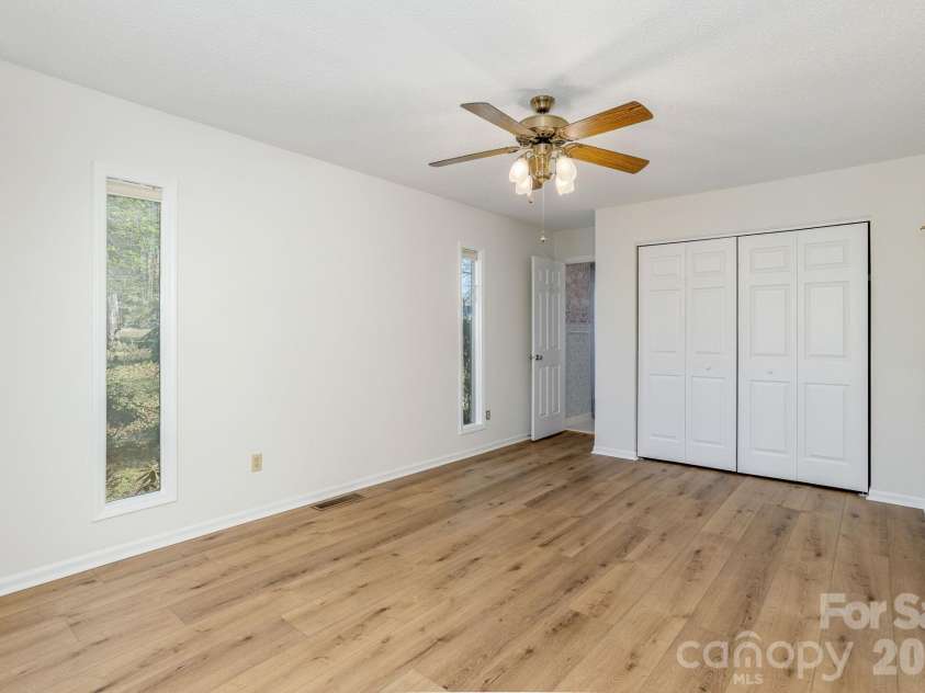 3113 Primrose Drive, Hendersonville, NC 28792.  MLS# CAR4359967, YatesRealty ID 13099. Primary bedroom