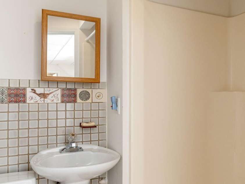 3113 Primrose Drive, Hendersonville, NC 28792.  MLS# CAR4359967, YatesRealty ID 13099. Third bathroom lower level