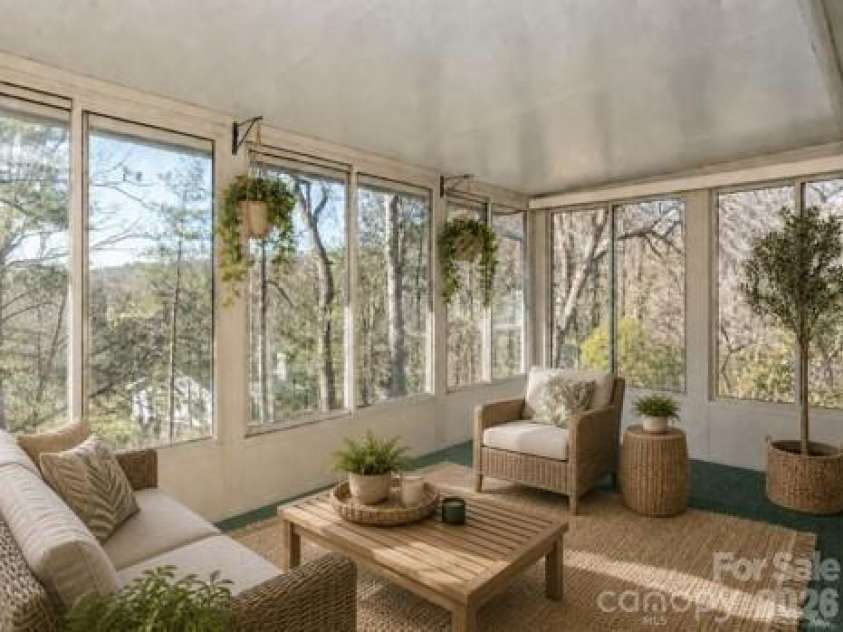 3113 Primrose Drive, Hendersonville, NC 28792.  MLS# CAR4359967, YatesRealty ID 13099. Virtually staged 4 seasons room